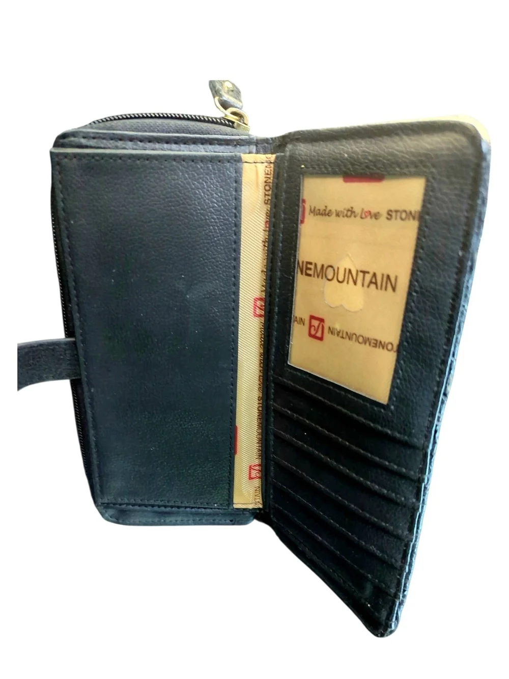 Stone Mountain Black Embossed Wristlet with Gold Accents